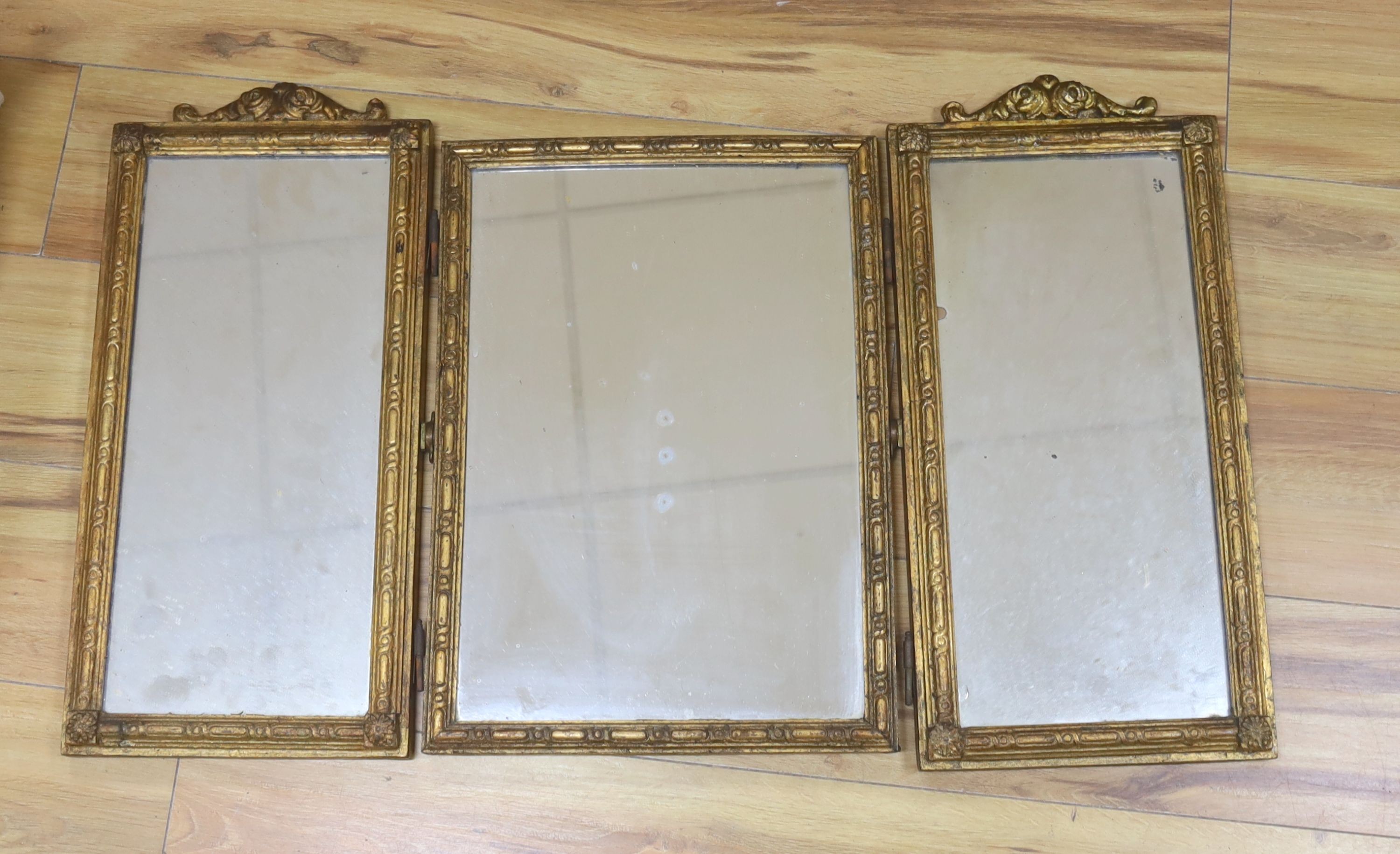 A gilt triptych mirror a.f